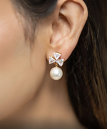 Load image into Gallery viewer, Crystal Bow Pearl Drop Earrings
